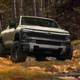 Image for article titled The Chevy Silverado EV Trail Boss Takes The Electric Truck Off-Road, Where The Ford F-150 Lightning Can't Follow